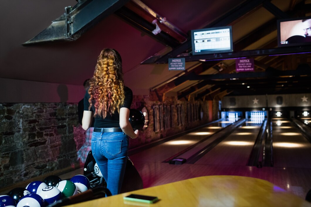 Modern hybrid sports lounge with screens and seating